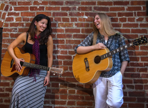 Joan and Joni (Kipyn Martin and Allison Shapira).